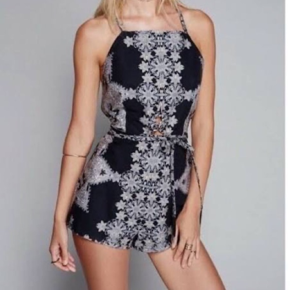 Free people open back cross strap floral romper SMALL
